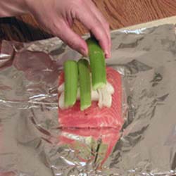 Place onion and celery on top